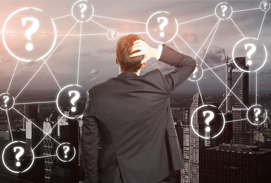 Businessperson facing cityscape with map of question marks - Marketing Myths